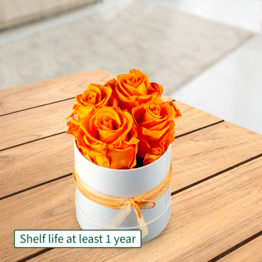 4 orange roses in a hat box