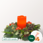 Arrangement with 1 red LED-Candle with 3 Ferrero Giotto